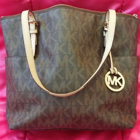 michael kors fix purses|Michael Kors refund policy.